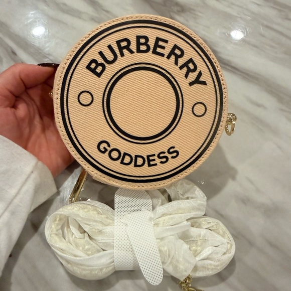 Burberry Accessories - Burberry GWP Beige Round Key Holder w/ goddess edp